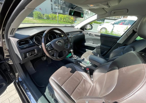 Skoda Superb cena 47300 przebieg: 247000, rok produkcji 2013 z Warszawa małe 67